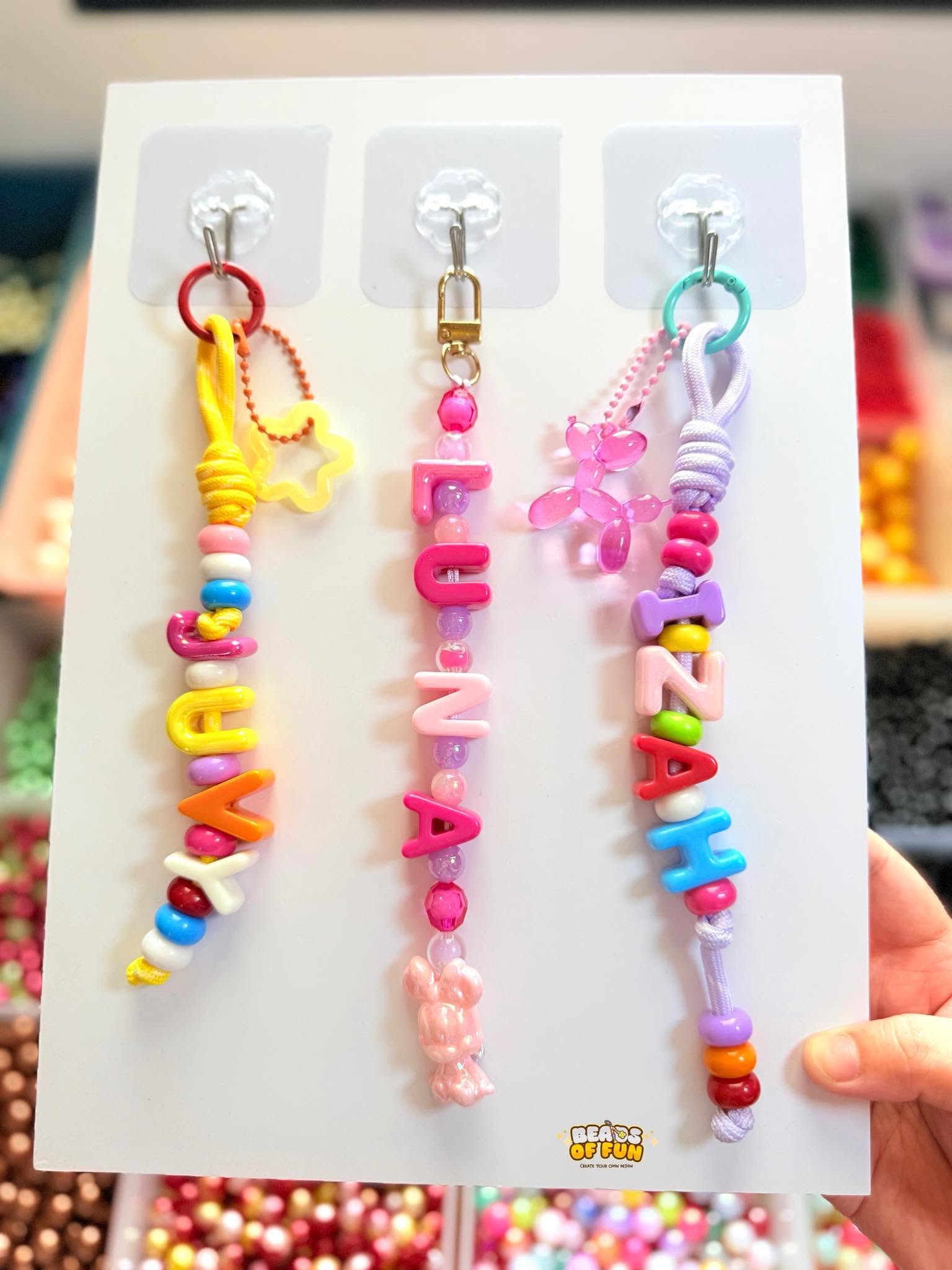 Three personalized charms